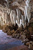 PAINSHILL PARK, SURREY: THE CRYSTAL GROTTO - THE INTERIOR WITH WOODEN CONES EMBEDDED WITH CRYSTALS - CLASSIC, OOLITIC LIMESTONE, MYSTERY, LANDSCAPE GARDEN, ORNAMENT