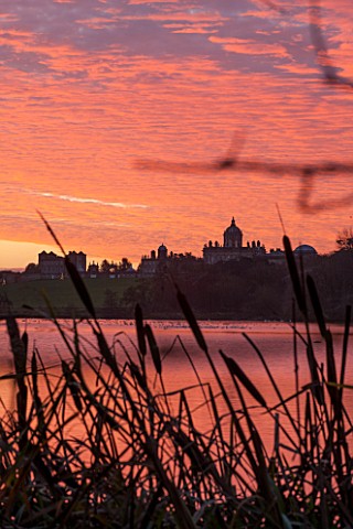 CASTLE_HOWARD_YORKSHIRE_CHRISTMAS__SUNRISE_OVER_THE_GREAT_LAKE_WITH_THE_HOUSE_IN_THE_BACKGROUND__WIN
