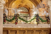 CASTLE HOWARD, YORKSHIRE: CHRISTMAS - THE BALCONY OF THE GREAT HALL DECORATED FOR CHRISTMAS - GARLANDS AND FRONDS OF ASPARAGUS - DECORATIVE, ORNAMENT, FESTIVE, WINTER, NOVEMBER