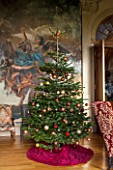 CASTLE HOWARD, YORKSHIRE: CHRISTMAS - DINING ROOM IN THE HIGH SALOON DECORATED FOR CHRISTMAS WITH CANDLES, CHRISTMAS TREES AND FESTIVE DECORATIONS - DECORATIVE, ORNAMENT, WINTER