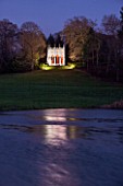 PAINSHILL PARK, SURREY: THE GOTHIC TEMPLE  LIT UP AT NIGHT - LIGHTING, FOLLY, FOLLIES, HISTORIC, LAKE, WATER, LANDSCAPE, WINTER, DECEMBER, CHRISTMAS, REFLECTION, REFLECTIONS
