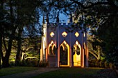 PAINSHILL PARK, SURREY: THE GOTHIC TOWER LIT UP AT NIGHT - LIGHTING, HISTORIC, LANDSCAPE, WINTER, DECEMBER, CHRISTMAS, FOLLY, BUILDING