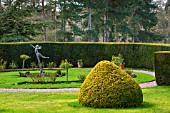 RODE HALL AND GARDENS, CHESHIRE: THE NESFIELD TERRACE AND ROSE GARDEN WITH SCULPTURE OF WOOD NYMPH BY DAVID WILLIAMS ELLIS. FEBRUARY, YEW, HEDGE, HEDGING, HEDGES, COUNTRY GARDEN