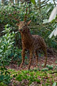 RODE HALL AND GARDENS, CHESHIRE: WICKER DEER SCULPTURE BY REDSTONE WILLOWS IN THE WOODLAND. ORNAMENT