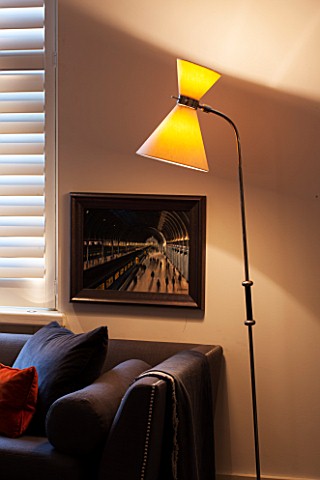 SALLY_STOREY_HOUSE_LONDON_OPEN_PLAN_SITTING_ROOM__HALL_WITH_SETTEE_WINDOW_BLINDS_AND_STANDARD_LAMP__