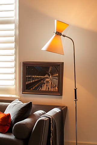 SALLY_STOREY_HOUSE_LONDON_OPEN_PLAN_SITTING_ROOM__HALL_WITH_SETTEE_WINDOW_BLINDS_AND_STANDARD_LAMP__