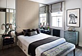 SALLY STOREY HOUSE, LONDON: MASTER BEDROOM WITH BED, CUSHIONS AND SIDEBOARDS WITH LIGHTS