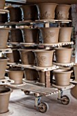 WHICHFORD POTTERY, WARWICKSHIRE: NEWLY THROWN TERRACOTTA CONTAINERS DRYING OUT IN THE WORKSHOP