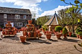 WHICHFORD POTTERY, WARWICKSHIRE: TERRACOTTA CONTAINERS ON SHOW IN THE SALES YARD