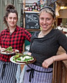 WHICHFORD POTTERY, WARWICKSHIRE: THE CAFE - MAIA KEELING AND CHRISTINE BOTTINE IN THE CAFE WITH FRESHLY PREPARED FOOD