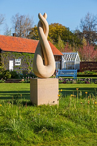 ULTING_WICK_ESSEX_SCULPTURE_IN_THE_GARDEN_IN_APRIL__LAWN_GREENHOUSE_STONE_ART__SPRING
