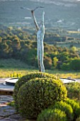 LA JEG, PROVENCE, FRANCE: DESIGNER ANTHONY PAUL - SCULPTURE MAN AND BIRD BY MARZIA COLONNA , MAY, MEDITERRANEAN, WATER, ORNAMENT, GARDEN, CLIPPED BOX, LAVENDER