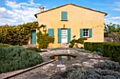 LA JEG, PROVENCE, FRANCE: DESIGNER ANTHONY PAUL - HOUSE AND FORMAL GARDEN WITH ROSA BANKSIAE LUTEA - BANKSIAN ROSE, ROSES, CLIMBER, RAMBLER, POOL, RILL, SPRING, MAY