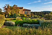 LA JEG, PROVENCE, FRANCE: DESIGN: ANTHONY PAUL - THE HOUSE WITH BLUE SHUTTERS, LAWN WITH STONE PAVING PATH, TAMARISK, SUMMER,  COUNTRY, GARDEN