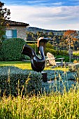 LA JEG, PROVENCE, FRANCE: DESIGNER ANTHONY PAUL - SCULPTURE LOVERS BY MARZIA COLONNA. SPRING. MEDITERRANEAN, GARDEN, GREEN, PROVENCE, MAY