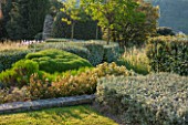 LA JEG, PROVENCE, FRANCE: DESIGNER ANTHONY PAUL - LAWN, CLIPPED PLANTS AND ELEAGNUS HEDGE. HEDGING, HEDGES. MEDITERRANEAN, GARDEN, GREEN, PROVENCE, MAY
