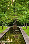 BRYANS GROUND, HEREFORDSHIRE: THE DUTCH CANAL WITH DOG STATUE AND PYRUS CALLERYANA CHANTICLEER - WATER FEATURE, WATER, RILL, POND, POOL, MAY, FORMAL, ENGLISH, GARDEN, COUNTRY