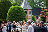CHELSEA FLOWER SHOW 2016: CROWDS AT CHELSEA 2016 WITH GARDEN BY DIARMUID GAVIN IN BACKGROUND