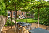 PRIVATE GARDEN LONDON DESIGNED BY LUCY WILLCOX AND ANA SANCHEZ MARTIN: TOWN GARDEN WITH LAWN, PATHS, WALL, PERGOLA, BORDERS, SEAT - JUNE, SUMMER, FORMAL, TABLE, CHAIRS