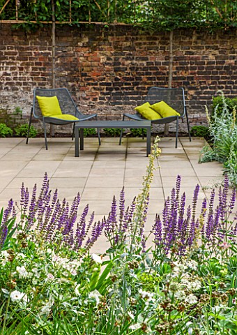 PRIVATE_GARDEN_LONDON_DESIGNED_BY_LUCY_WILLCOX_AND_ANA_SANCHEZ_MARTINPATIO_WITH_SALVIA_METAL_CHAIRS_