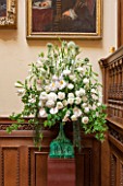 CHATSWORTH HOUSE, DERBYSHIRE: FLORABUNDANCE-THE OAK STAIRS; MAGNIFICENT MALACHITE VASE WITH ALLIUM MOUNT EVEREST AND WHITE PEONY DUCHESSE DE NEMOURS WITH GREEN FOLIAGE. DISPLAY