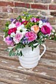 THE REAL FLOWER COMPANY: WHITE PORCELAIN JUG WITH A MIXTURE OF DAVID AUSTIN ROSES KATE, MIRANDA AND KIERA WITH SENECCIO AND WILDFLOWERS.PRETTY,SUMMER,FLOWERS,FRAGRANT,VINTAGE
