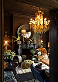 ABIGAIL AHERN HOUSE, LONDON: THE OFFICE / STUDIO. FIREPLACE, CONVEX MIRROR, ROOM PAINTED IN HUDSON BLACK PAINT, LAZZARO CHANDELIER - LIGHTS, LIGHTING