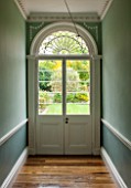 MORTON HALL, WORCESTERSHIRE: FRENCH DOOR WITH FANLIGHT TO SOUTH GARDEN