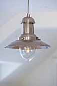 THE COACH HOUSE,SURREY: THE KITCHEN. DETAIL OF BRUSHED STEEL CEILING PENDANT LIGHT