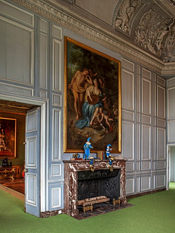 VAUX_LE_VICOMTE_FRANCE_THE_KINGS_FORMER_STUDY_AT_CHRISTMAS_GREY_PANELLED_WALLS_AND_MARBLE_FIREPLACE