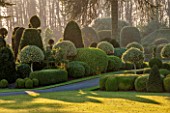 BRODSWORTH HALL, YORKSHIRE: DAWN. WINTER, JANUARY, TOPIARY EVERGREEN, BORDER, FORMAL, GARDEN, COUNTRY, CLIPPED, HEDGE, HEDGES, HEDGING, ITALIANATE SUMMERHOUSE