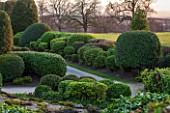 BRODSWORTH HALL, YORKSHIRE: DAWN. WINTER, JANUARY, TOPIARY EVERGREEN, BORDER, FORMAL, GARDEN, COUNTRY, CLIPPED, HEDGE, HEDGES, HEDGING