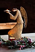 THE FREETH, HEREFORDSHIRE: KITCHEN, DINER - GOLDEN ANGEL CANDLE HOLDERS. CHRISTMAS