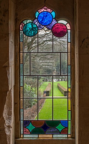 PAINSWICK_ROCOCO_GARDEN_GLOUCESTERSHIRE_STAINED_GLASS_IN_A_WINDOW_IN_THE_RED_HOUSE_GOTHIC_BUILDING_F