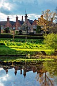 FELLEY PRIORY, NOTTINGHAMSHIRE: VIEW OF THE PRIORY FROM THE LAKE IN SPRING, MARCH, ENGLISH, COUNTRY, GARDEN, FLOWERS, BLOOMING, POND, POOL, WATER