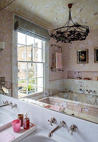 LONDON_HOUSE_DESIGNED_BY_JULIE_SIMONSEN_PINK_BATHROOM_CHERRY_BLOSSOM_ON_TRAY_WITH_FAKE_VERRE_EGLOMIS