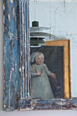 LONDON HOUSE DESIGNED BY JULIE SIMONSEN. DETAIL OF DUTCH PAINTING AS SEEN IN MIRROR IN LIVING ROOM