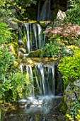 CHESTER ZOO, CHESHIRE: WATERFALL IN SPRING. MOVEMENT, MOVING, WATER