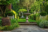 HAZELBY HOUSE, BERKSHIRE: LAWN, BORDERS, HEDGES, HEDGING, SUMMER, GARDEN, GREEN, TERRACOTTA CONTAINER, STONE URN, TERRACE