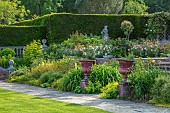 HAZELBY HOUSE, BERKSHIRE: LAWN, BORDERS, HEDGES, HEDGING, SUMMER, GARDEN, CONTAINERS, STATUE, ALCHEMILLA, GEUMS, ROSES