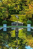 HAZELBY HOUSE, BERKSHIRE: FORMAL, WATER,  POND, POOL, CANAL, WOODEN BENCH, SEAT, REFLECTIONS, REFLECTED