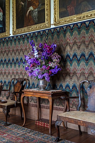 PARHAM_SUSSEX_WEST_ROOM__SILVER_CONTAINER_WITH_DELPHINIUM_BRUCE_GLADIOLI_VELVET_EYES_AND_HOME_COMING