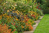 BOURTON HOUSE GARDEN, GLOUCESTERSHIRE: LAWN, BORDER WITH DAHLIA MOONFIRE, AUTUMN, FALL, SEPTEMBER, ENGLISH, HERBACEOUS, LATE, SUMMER, CLASSIC, ENGLISH