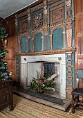 BADDESLEY CLINTON, WARWICKSHIRE: THE NATIONAL TRUST- CHRISTMAS, 15TH AND 16TH CENTURY MOATED MANOR HOUSE. HENRY FERRERS BEDROOM, FOUR POSTER BED, FIREPLACE