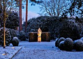 MORTON HALL, WORCESTERSHIRE: WINTER - FROST, SNOW, CLIPPED TOPIARY BOX BALLS, STATUE, NIGHT, MOONLIGHT, COLD, DECEMBER, LIGHTING, LIGHTS, ENGLISH, COUNTRY, GARDEN