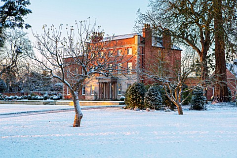 MORTON_HALL_WORCESTERSHIRE_WINTER__VIEW_OF_HOUSE_FROM_PARKLAND_FROST_SNOW_COLD_DECEMBER_ENGLISH_COUN