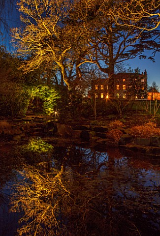 MORTON_HALL_WORCESTERSHIRE_NIGHT_TIME_LIGHTS_LIGHTING_EVENING_WATER_GARDEN_COUNTRY_HOUSE_TREES_POND_