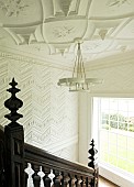 WARDINGTON MANOR, OXFORDSHIRE: WHITE PANELLING BESIDE WOODEN STAIRCASE