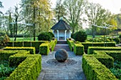 MITTON MANOR, STAFFORDSHIRE: PATH, TOPIARY GARDEN, FORMAL, COUNTRY, BOX, TOPIARY, HEDGES, HEDGING, EVERGREEN, SUMMERHOUSES, NEIL WILKIN GLASS SCULPTURS