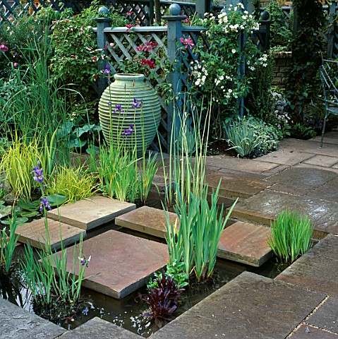 WATER_FEATURE_SQUARE_STEPPING_STONES_ACROSS_SUNKEN_POND_LARGE_VERDIGRIS_STONEWARE_POT_SUNDAY_TIMES_G